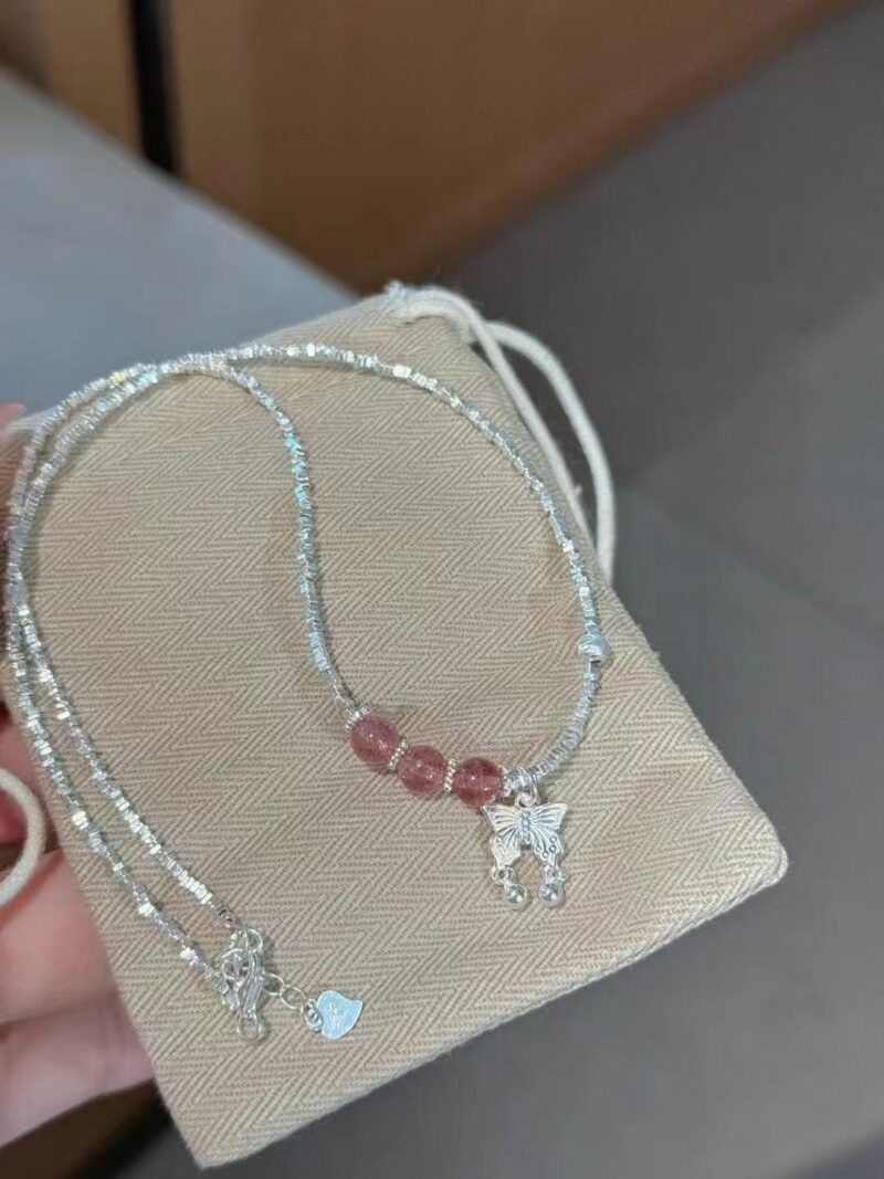 Silver bow necklace